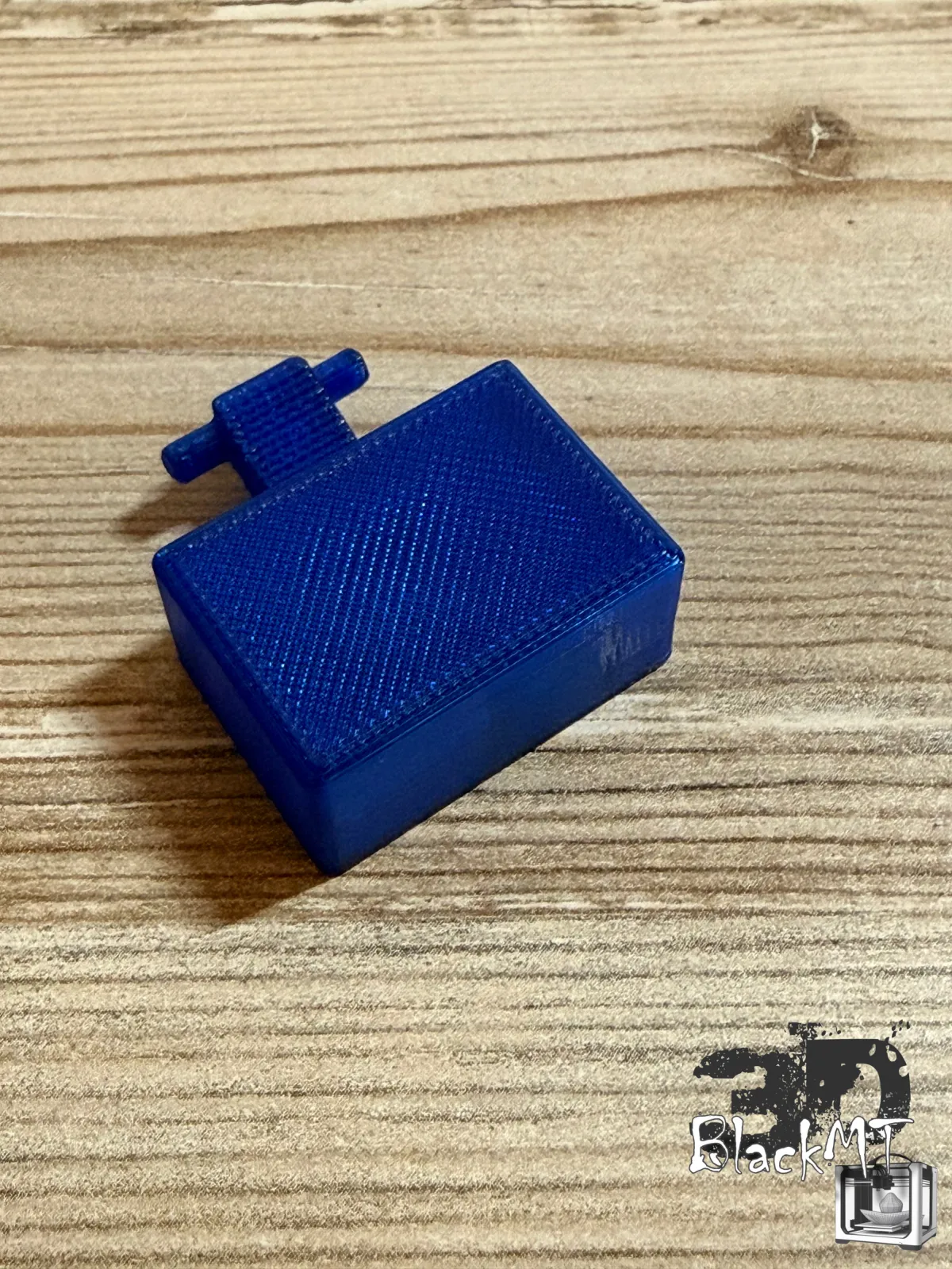 Close-up of the blue 3DBlackMT replacement float made from PETG with the magnet fitted