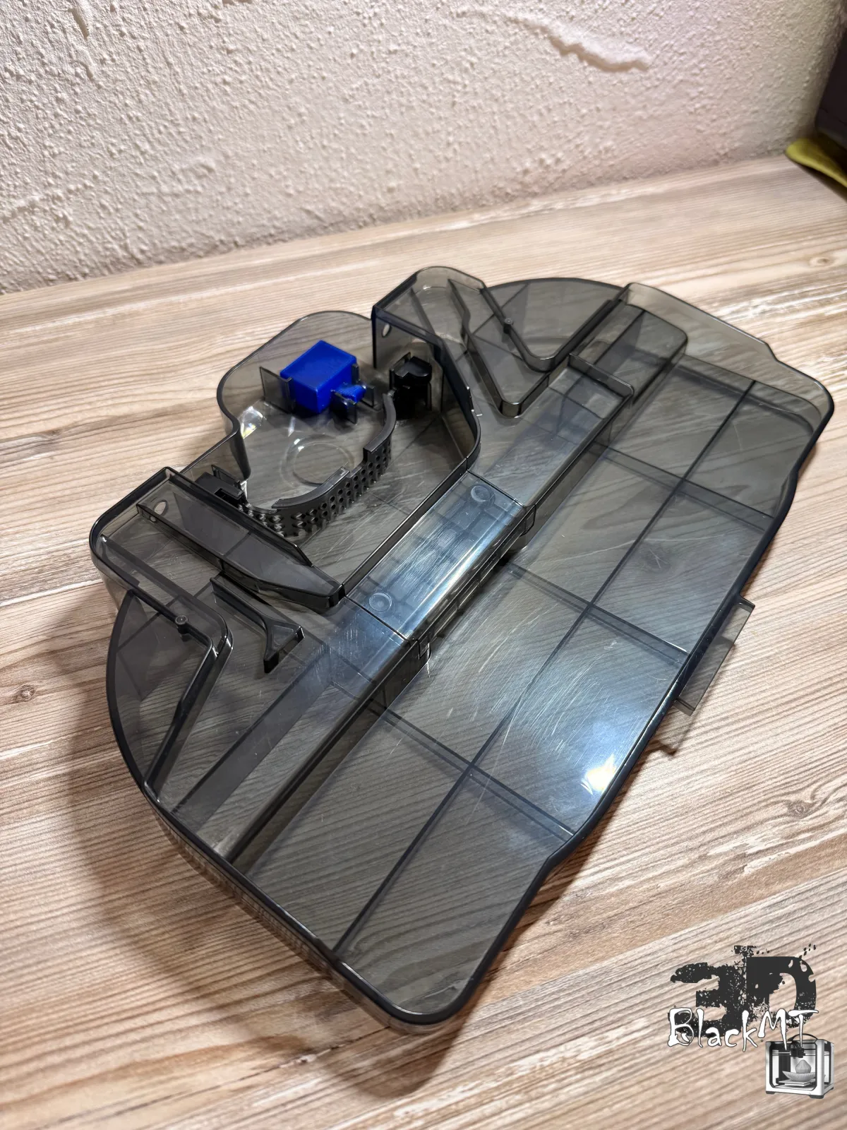 Water tray of the Ecovacs Deebot X9 at an angle with the blue float fitted